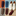 Rolled neckties sitting next to white sneakers