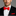Man wearing a black suit with a red bow tie and pocket square on a gray background