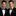 Two men in suits with colorful bow ties against a neutral background