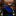 Black tie with blue geometric pattern on a reflective surface with blurred colorful background