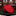 Red tie on a black marble surface with a blurred garden background