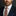 Peach Floral Tie and Accenting Blue and brown Handkerchief on man wearing suit