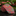 Pink, Orange Paisley Necktie with colorful patterns on a reflective surface with flowers in the background