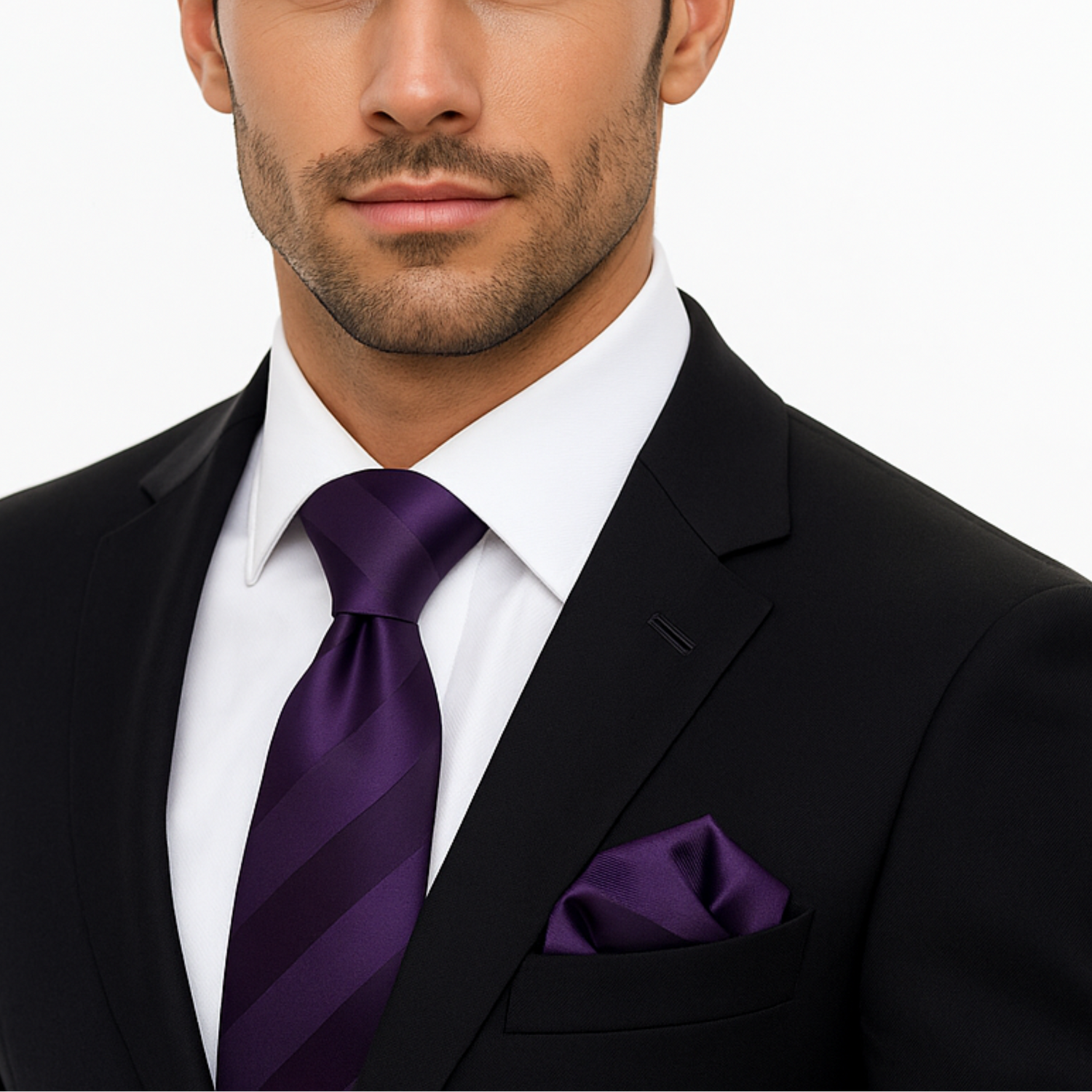 Man wearing a black suit with a purple block stripe tie and pocket square on a white background