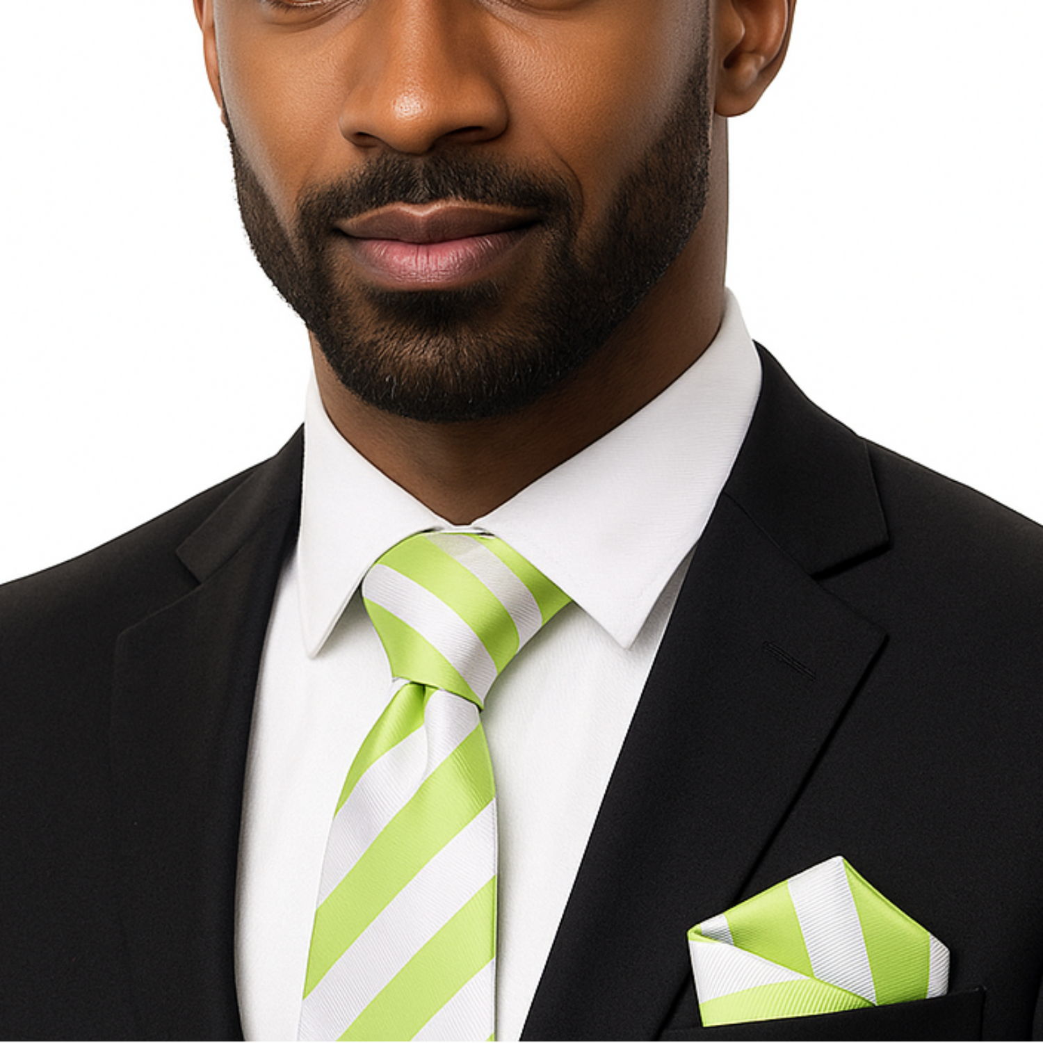 Man wearing a black suit with a white shirt and green and white striped tie on a white background