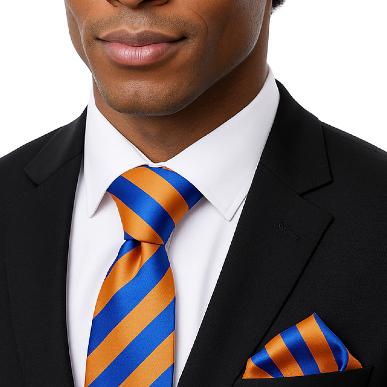 Man wearing a black suit with an orange and blue striped tie and pocket square.