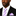 Man wearing a black suit with a purple striped tie and pocket square on a white background