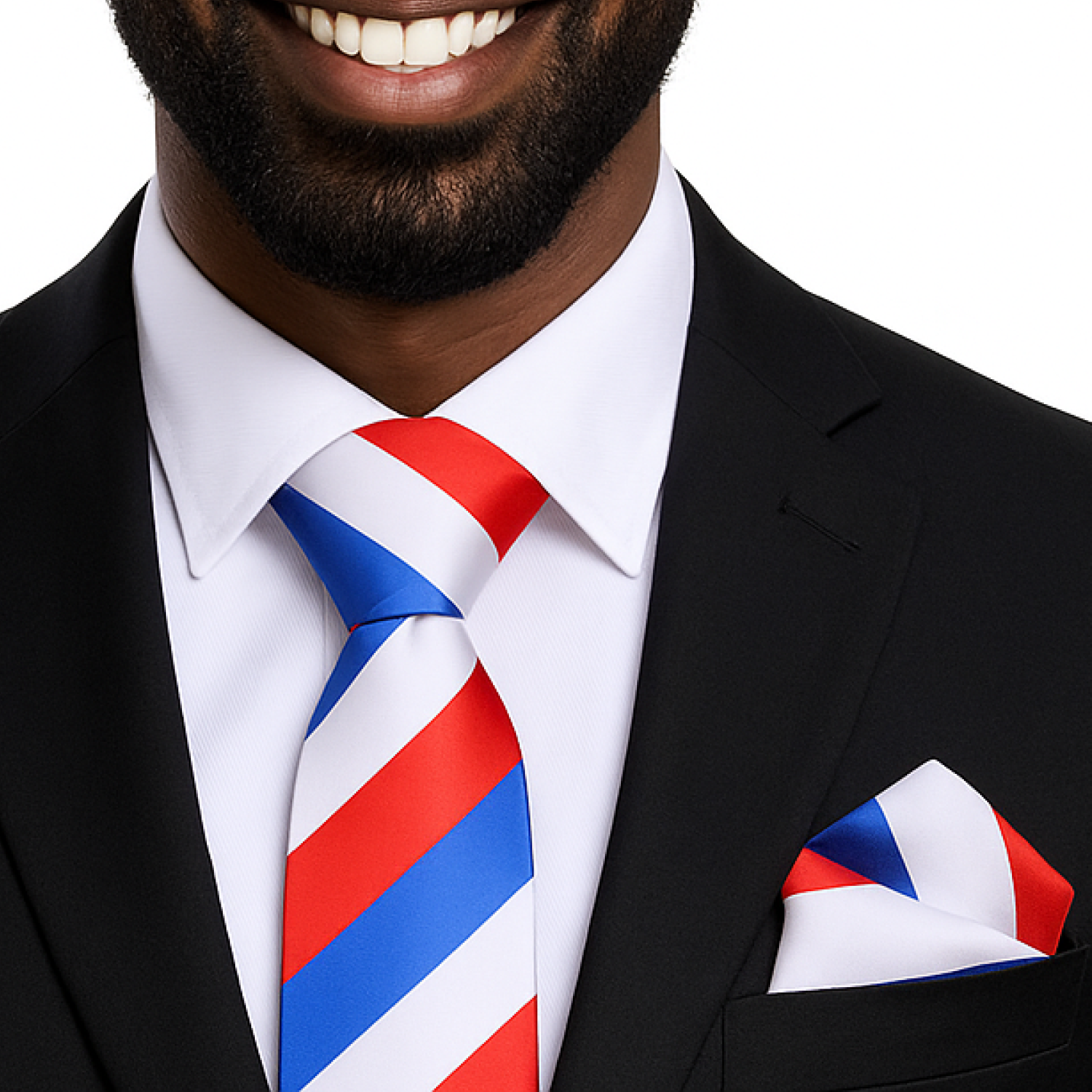Man wearing a black suit with a red, white, and blue striped tie and pocket square.