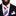 Man wearing a black suit with a red, white, and blue striped tie and pocket square.