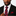 Man wearing a black suit with a red and blue striped tie and matching pocket square on a gray background