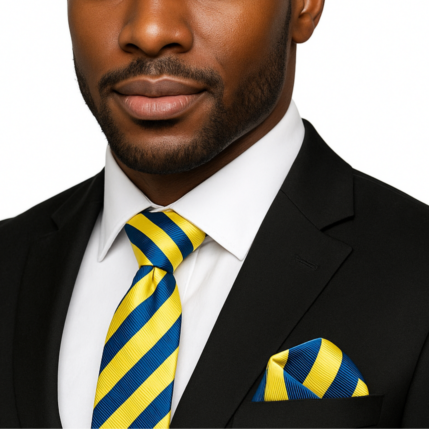 Man wearing a black suit with a yellow and blue striped tie and pocket square on a white background
