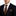A Brown, Black Check Pattern Necktie on man wearing black suit