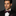 Plum Plaid Bow Tie and Square on man Wearing Black Suit