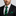 Man wearing black and green stripe tie and square