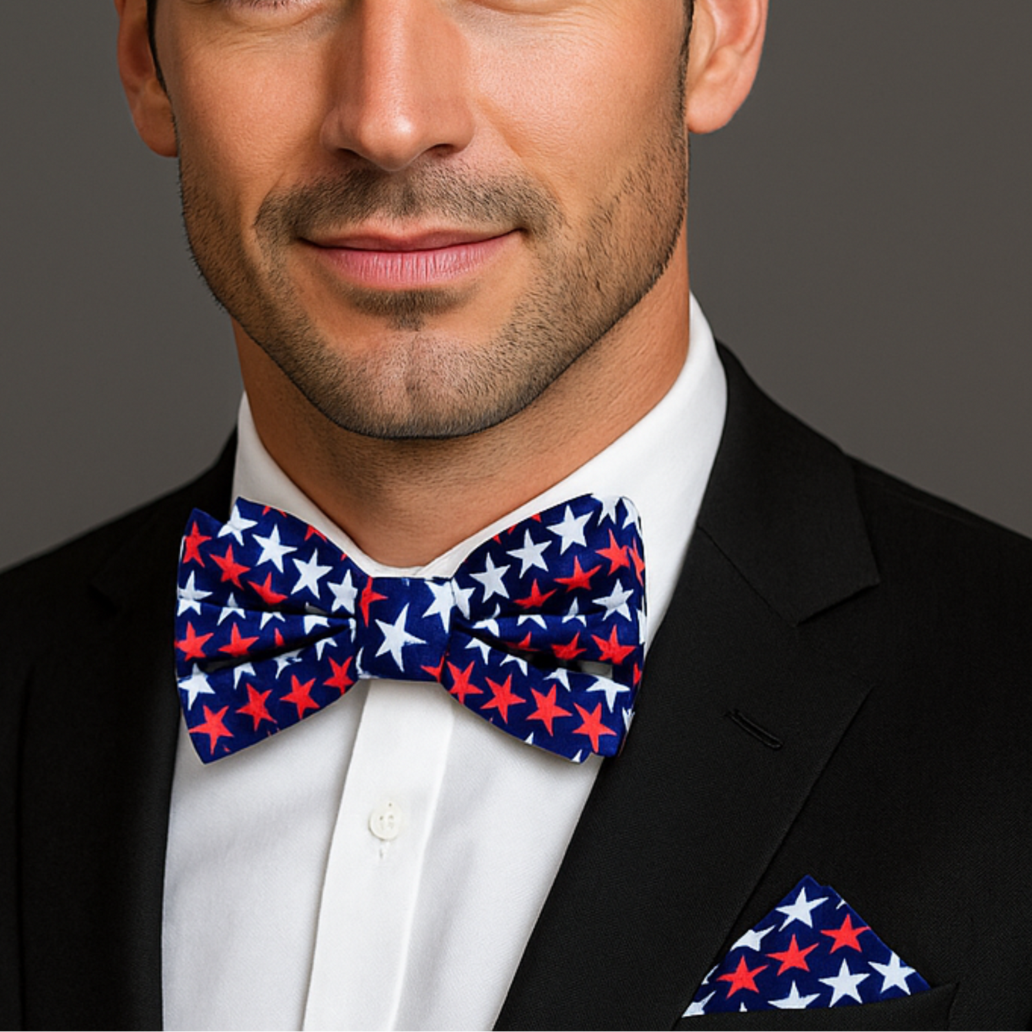 Man wearing a black suit with a Blue, Red, Blue Patriotic Stars Bow Tie and Pocket Square