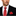 Man wearing a black suit with a Red, Green, White Candy Cane Necktie And Pocket Square