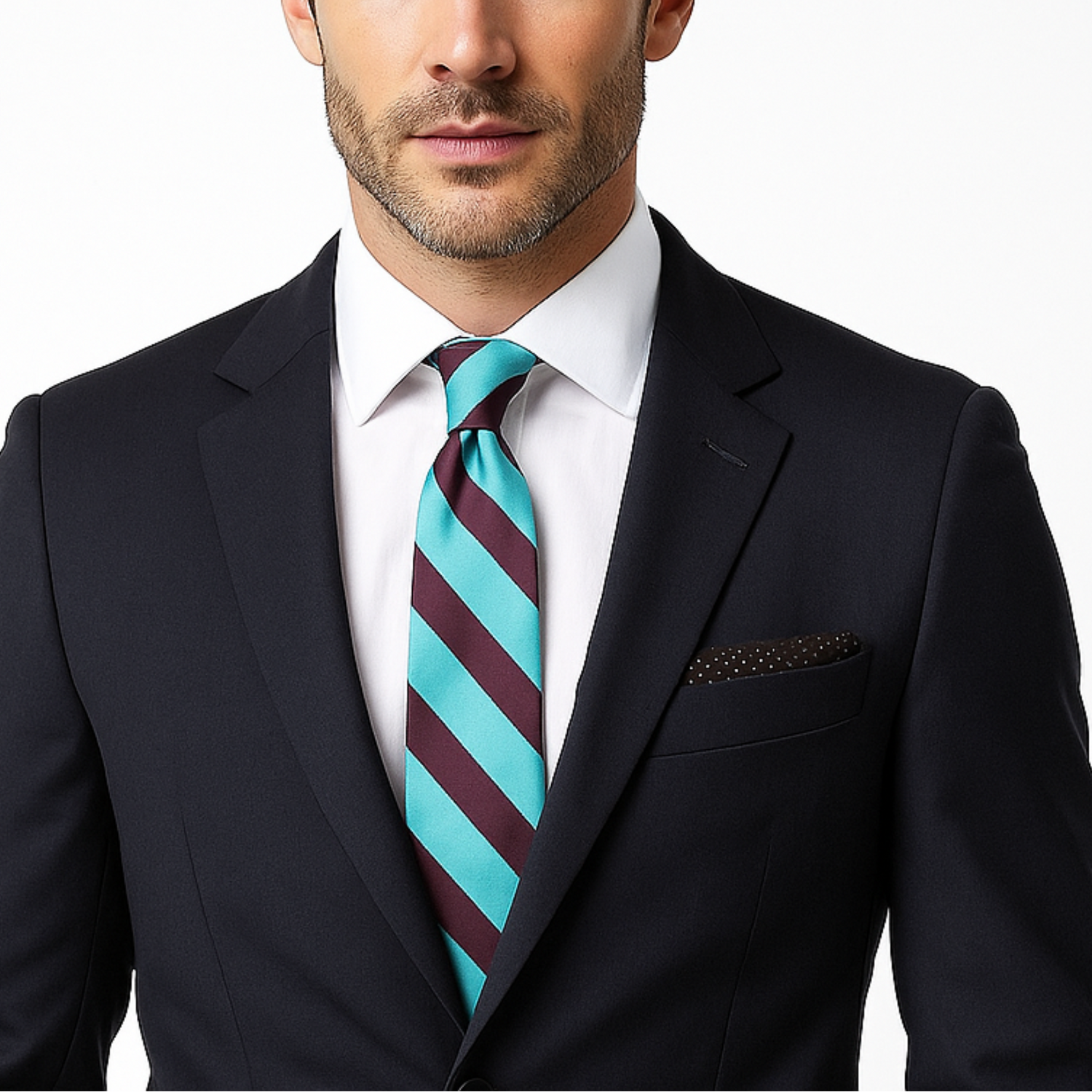 Man wearing a dark suit with a brown and green striped tie and accenting square on a white background
