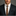 Man wearing a black suit with a white shirt and leopard print thin tie with black square on a gray background