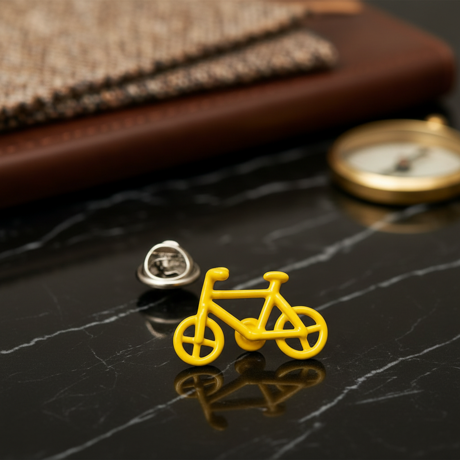 Small yellow bike lapel pin