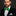 Green Silk with Red Candy Cane Bow Tie and Accenting pocket Square on a man wearing a suit