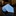 Light blue tie on a dark marble surface with a blurred background