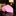 Pink necktie on a dark marble surface with a blurred background