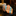 Plaid tie with orange and blue stripes on a dark surface