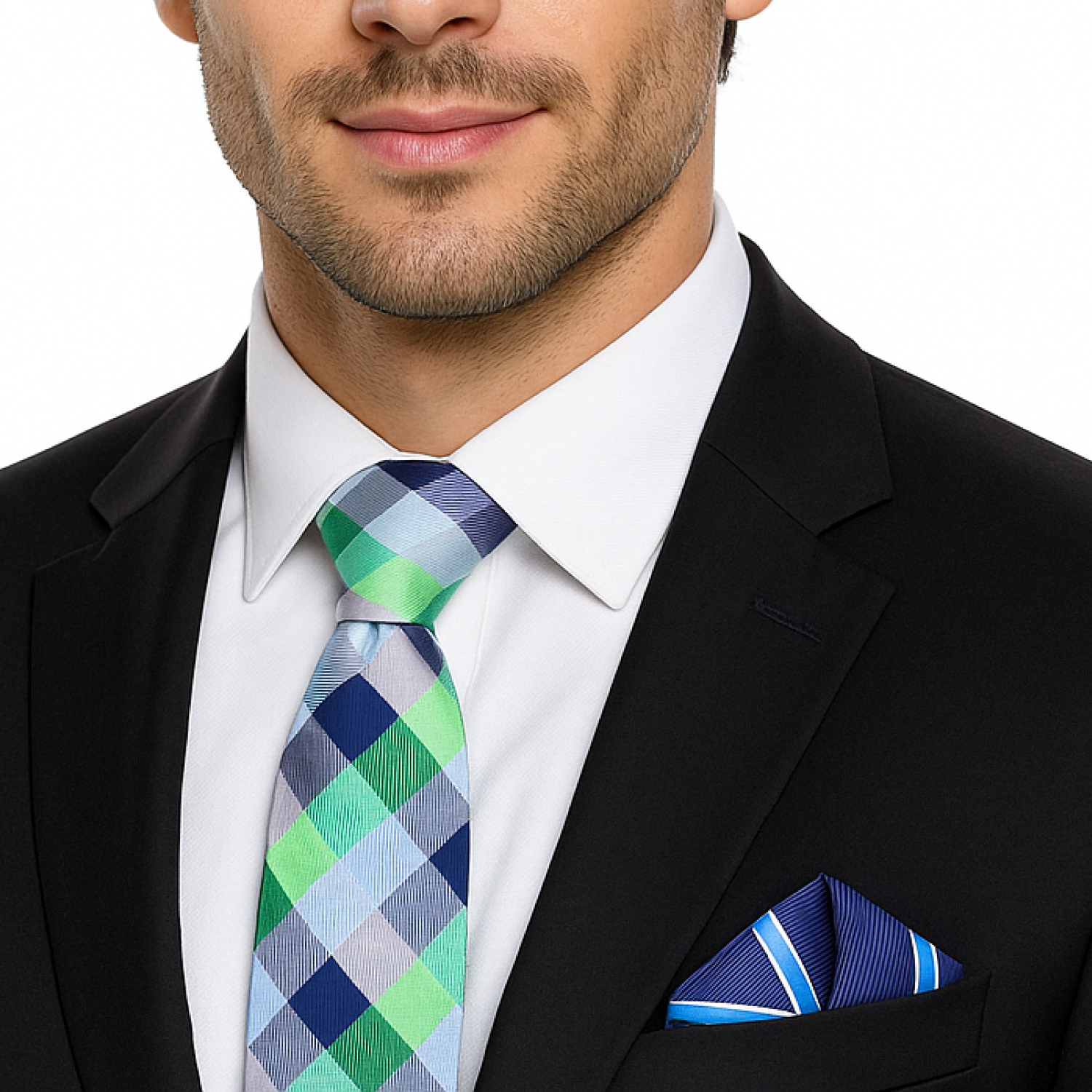 Man wearing a black suit with a blue and green checkered tie and matching pocket square.