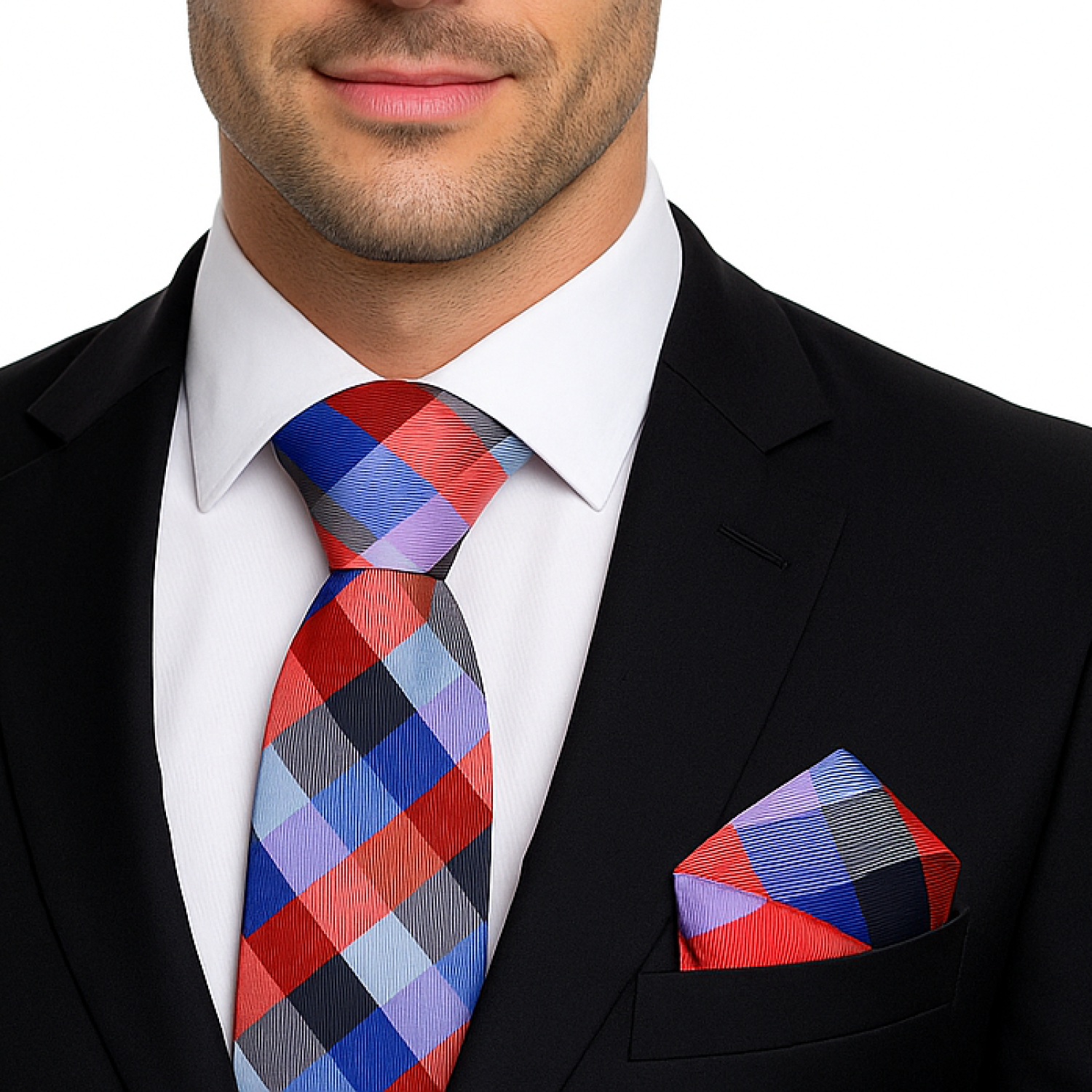 Man wearing a black suit with a colorful checkered tie and pocket square on a white background
