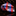 Plaid tie with red, blue, and black pattern on a dark surface