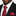 Man wearing a black suit with a red tie and matching pocket square featuring blue polka dots.