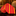 Red and yellow striped tie on a reflective surface with a blurred background