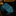 Teal patterned fabric on a dark surface with a blurred gold frame in the background