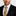 Golden Brown, Black, White, Red Plaid Tie and accenting polka square on man