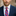 Red, Blue and White Stripe Tie on Man Wearing Suit