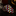 Checkered tie with red, yellow, and black pattern on a dark surface