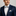 Blue, Brown Check Bow Tie and Square on man wearing suit