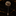 Decorative lapel pin on a dark marble background