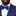Man wearing a navy suit with a blue paisley bow tie and pocket square.