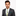 Man wearing a gray suit with a colorful tie and green pocket square on a white background