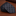 Black patterned tie on a dark textured background