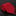 Red tie with white geometric pattern on a black marble surface