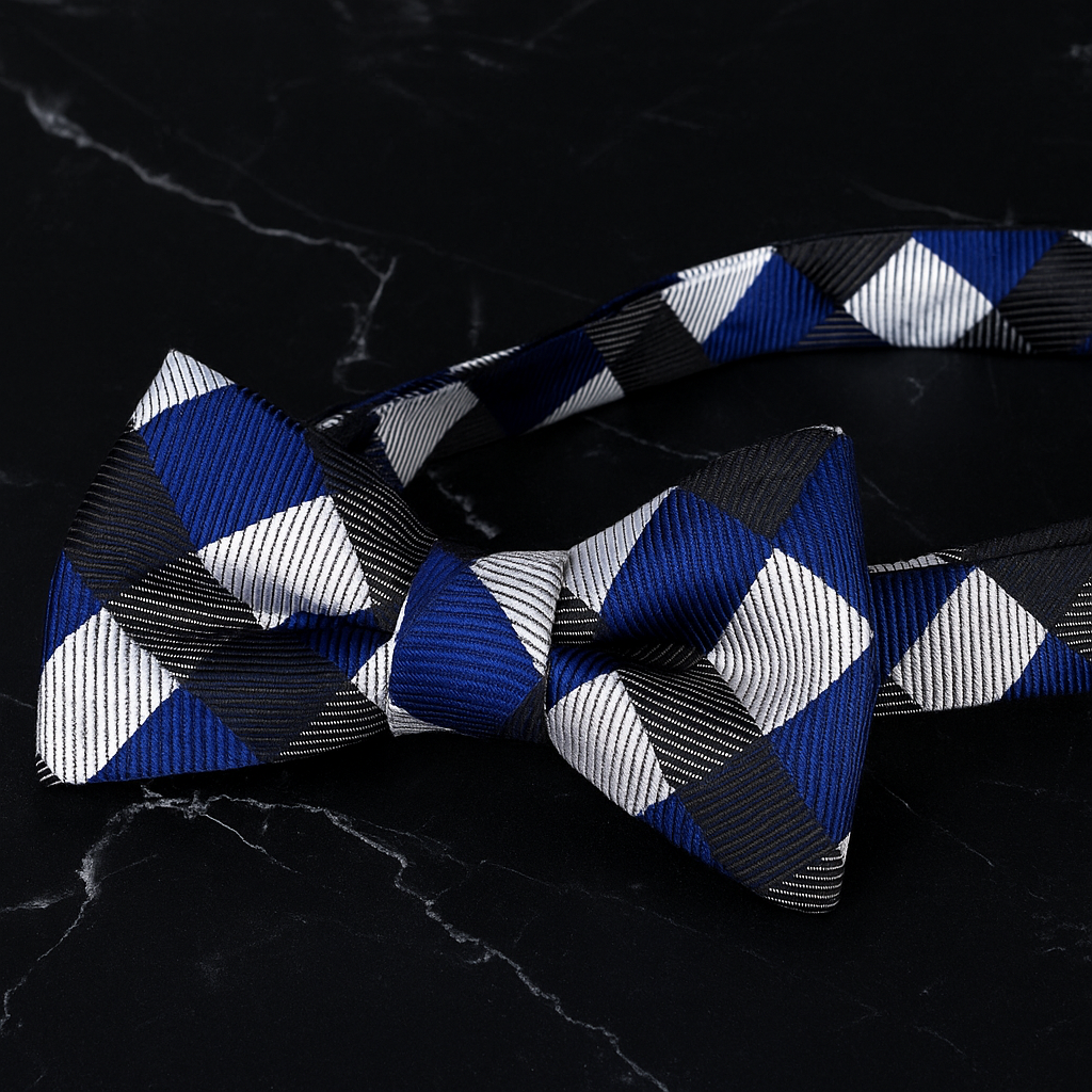 Blue, white, and black checkered bow tie on a dark textured background
