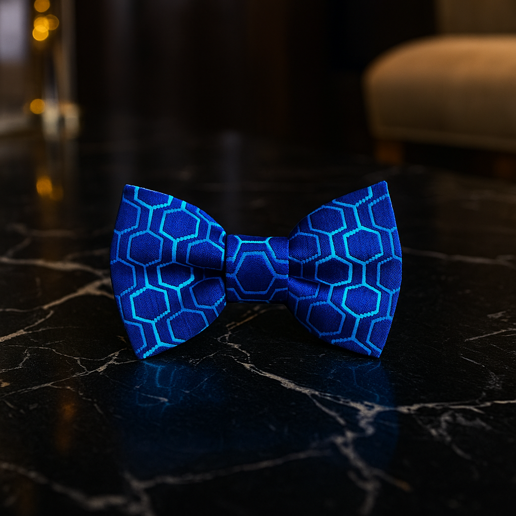 Blue honeycomb patterned bow tie on a dark marble surface