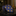 Blue tie with gold polka dots on a reflective surface