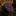 Black tie with pink polka dots on a reflective surface