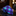 Purple and blue checkered tie on a dark surface