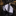 Roll of black and white patterned fabric on a reflective surface with a dark background