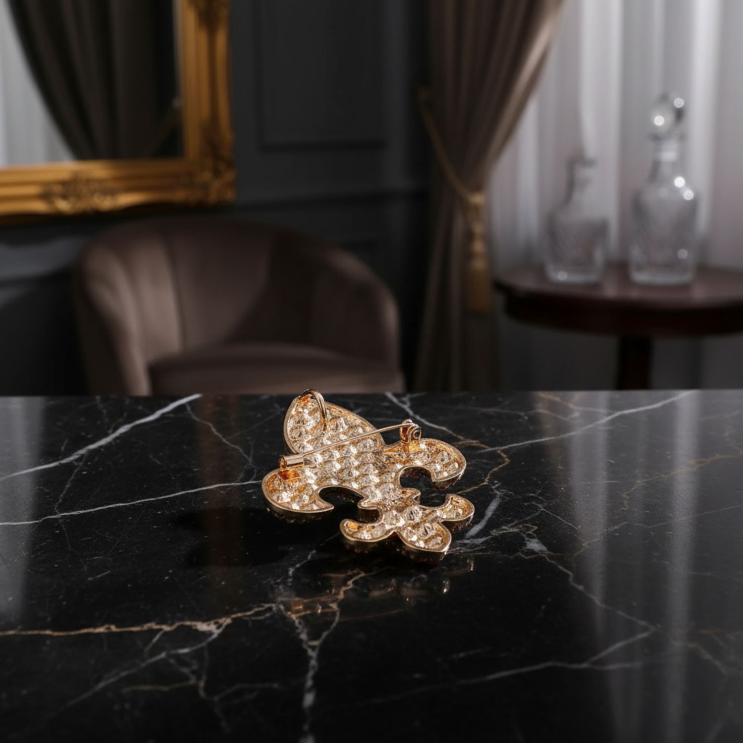 Gold fleur-de-lis brooch