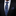 Man wearing a black suit with a blue paisley tie and pocket square.